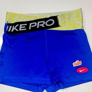 Nike Pro Blue Athletic Shorts with Yellow Waistband